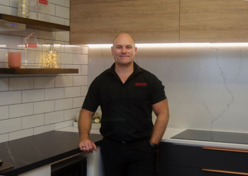 Adrian Kay, long-time Dream Doors franchise owner, at work with his team